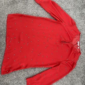 Reitman’s elbow length blouse